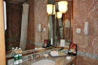 Imagen de la habitación del Hotel KunMing. Foto 13