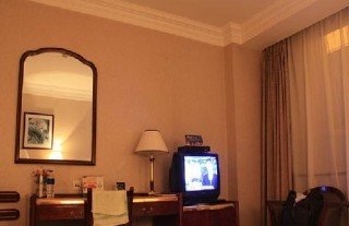 Imagen de la habitación del Hotel KunMing. Foto 14