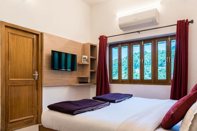 Imagen de la habitación del Hotel Kunkhet Valley Resort. Foto 15