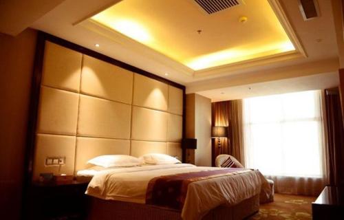 Imagen de la habitación del Hotel Kunlun Zhongxin Street. Foto 10