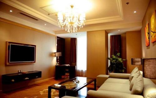 Imagen de la habitación del Hotel Kunlun Zhongxin Street. Foto 11