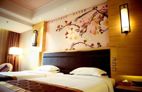 Imagen de la habitación del Hotel Kunlun Zhongxin Street. Foto 13