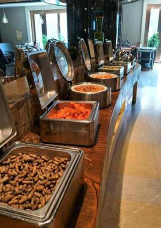 Imagen del bar/restaurante del Hotel Kunlun Zhongxin Street. Foto 8