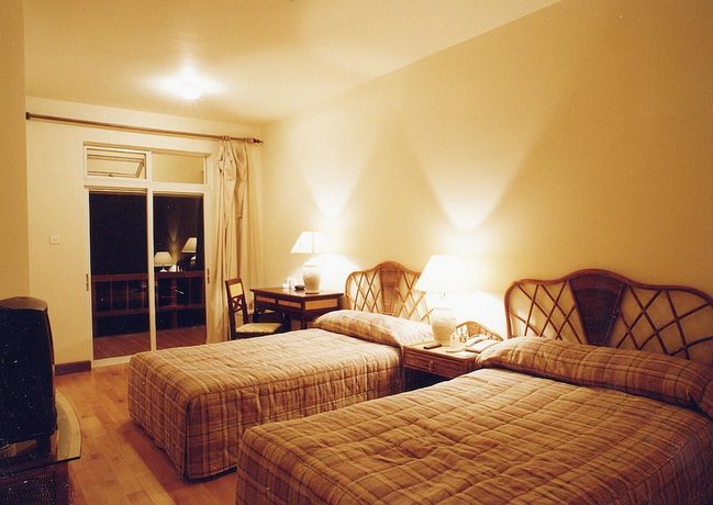 Imagen de la habitación del Hotel Kunming Dianchi Garden and Spa. Foto 14