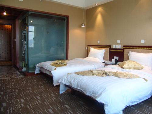 Imagen de la habitación del Hotel Kunming Golden Spring. Foto 4