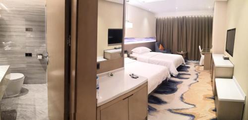 Imagen de la habitación del Hotel Kunming Golden Spring. Foto 5