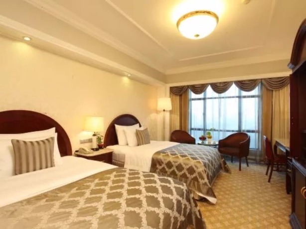Imagen de la habitación del Hotel Kunming Green Lake. Foto 4