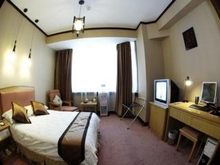 Imagen de la habitación del Hotel Kunming Guihua. Foto 4