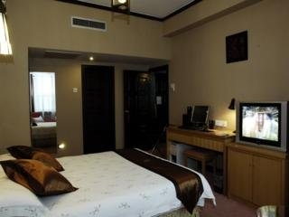 Imagen de la habitación del Hotel Kunming Guihua. Foto 5