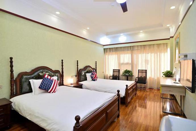 Imagen de la habitación del Hotel Kunming Ha Te Da Zhen Plaza. Foto 3