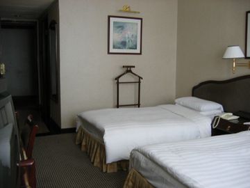 Imagen de la habitación del Hotel Kunming Tailong Hongrui. Foto 2