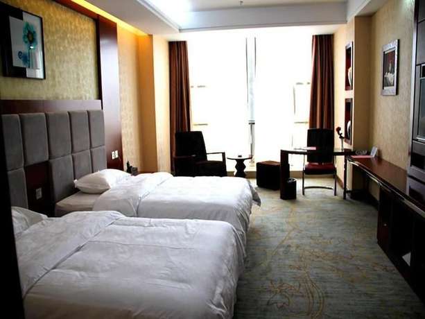 Imagen de la habitación del Hotel Kunming Tangyun Hotel. Foto 5