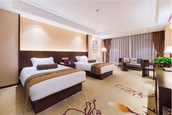 Imagen de la habitación del Hotel Kunming Wan Jin An Hotel. Foto 4