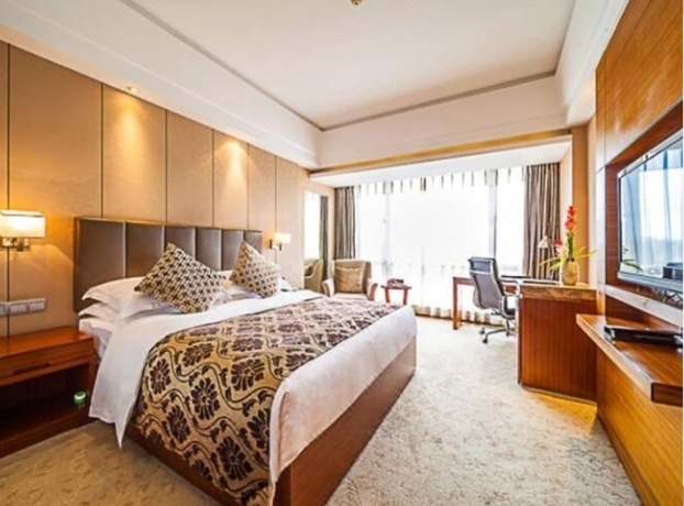 Imagen de la habitación del Hotel Kunming West Inn. Foto 4