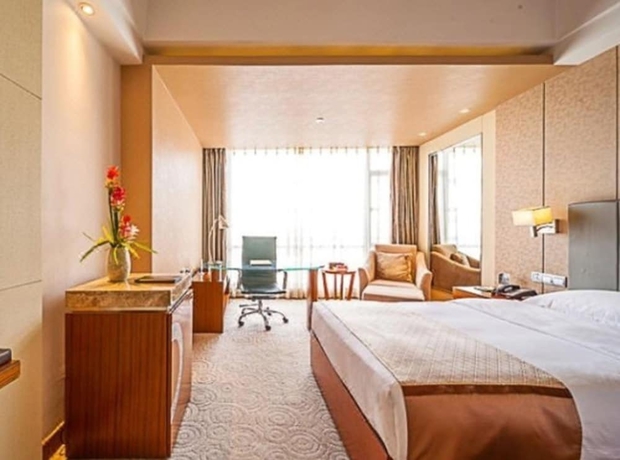 Imagen de la habitación del Hotel Kunming West Inn. Foto 5