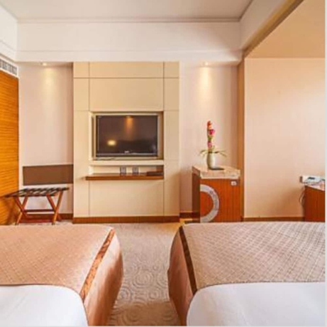 Imagen de la habitación del Hotel Kunming West Inn. Foto 7