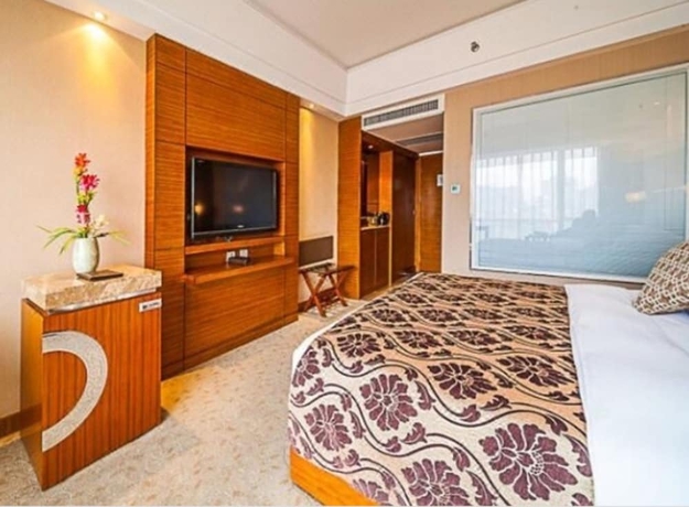 Imagen de la habitación del Hotel Kunming West Inn. Foto 8