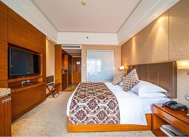 Imagen de la habitación del Hotel Kunming West Inn. Foto 9