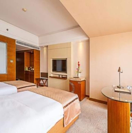 Imagen de la habitación del Hotel Kunming West Inn. Foto 10