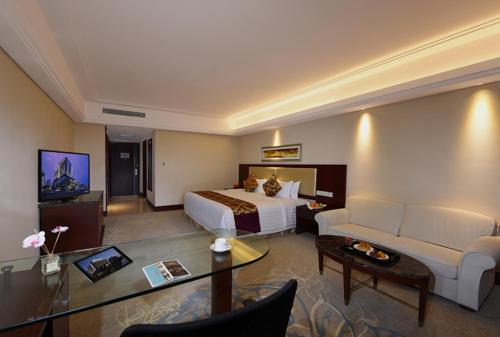 Imagen de la habitación del Hotel Kunshan International Hotel. Foto 6
