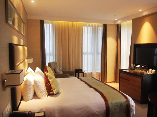 Imagen de la habitación del Hotel Kunshan Jinling Hotel. Foto 5