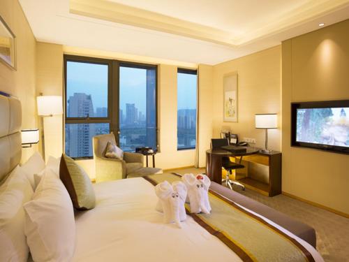 Imagen de la habitación del Hotel Kunshan Jinling Hotel. Foto 6