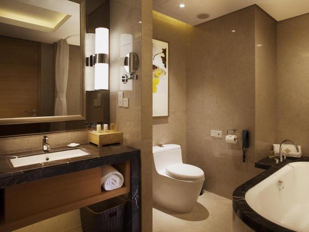 Imagen de la habitación del Hotel Kunshan Jinling Hotel. Foto 9