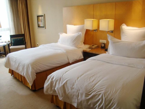 Imagen de la habitación del Hotel Kunshan Newport. Foto 12