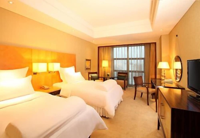 Imagen de la habitación del Hotel Kunshan Newport. Foto 13