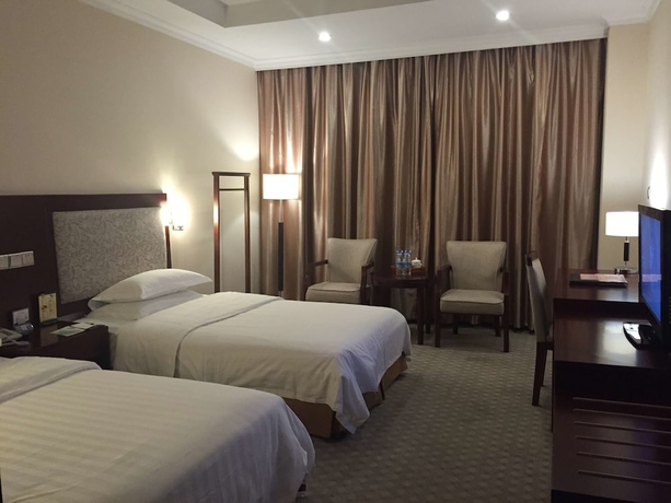 Imagen de la habitación del Hotel Kunshan Yuxing. Foto 4