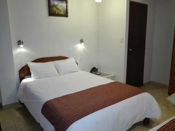 Imagen de la habitación del Hotel Kuntur House. Foto 10