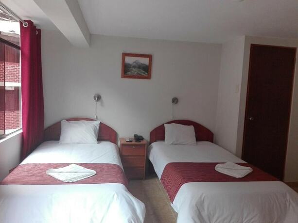 Imagen de la habitación del Hotel Kuntur House. Foto 11