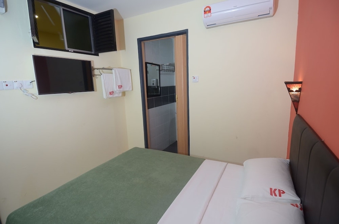 Imagen de la habitación del Hotel Kuok Pin. Foto 2