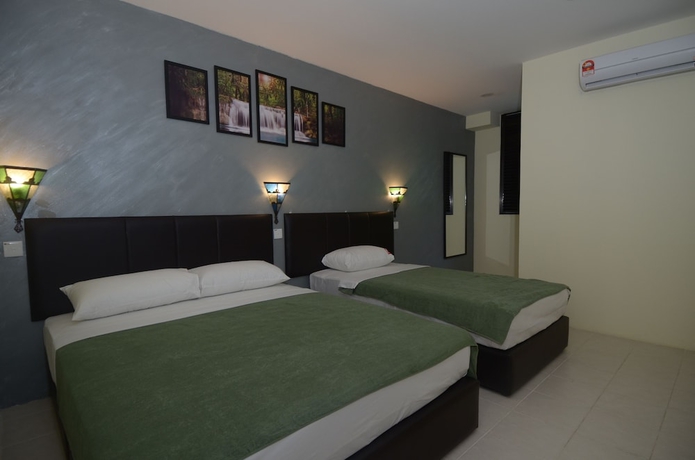 Imagen de la habitación del Hotel Kuok Pin. Foto 3