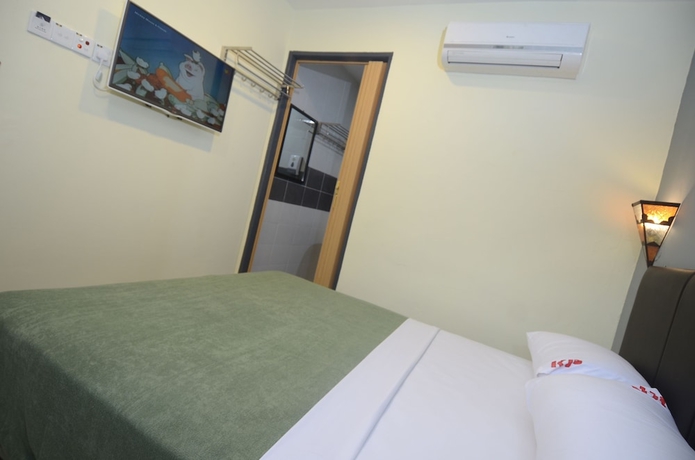 Imagen de la habitación del Hotel Kuok Pin. Foto 5