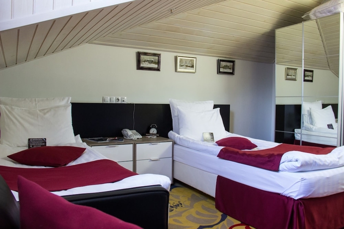 Imagen de la habitación del Hotel Kupechesky Dvor. Foto 4