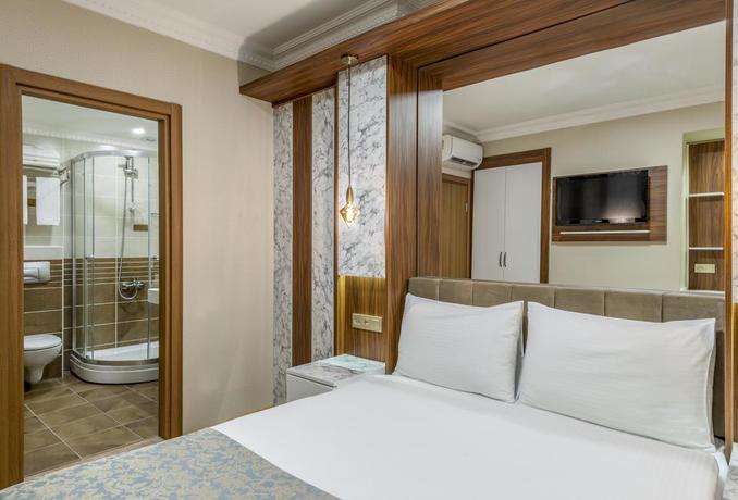 Imagen de la habitación del Hotel Kupeli. Foto 8