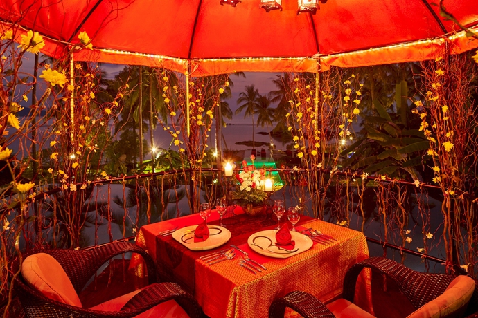 Imagen del bar/restaurante del Hotel Kupu Kupu Phangan Beach Villas and Spa. Foto 1