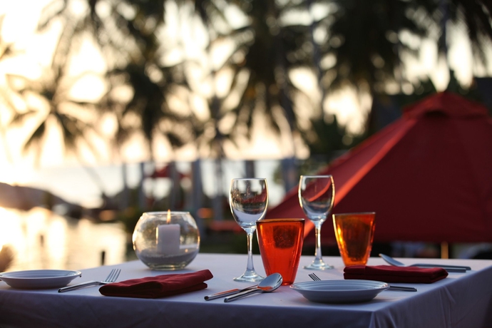 Imagen del bar/restaurante del Hotel Kupu Kupu Phangan Beach Villas and Spa. Foto 3