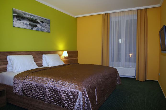 Imagen de la habitación del Hotel KurBrussel. Foto 16
