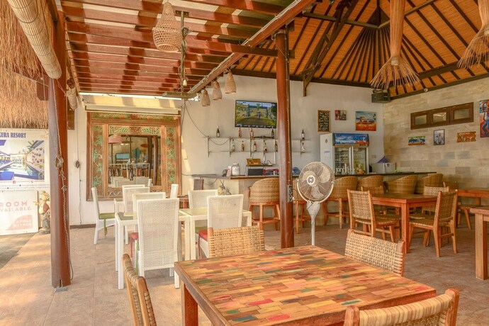 Imagen del bar/restaurante del Hotel Kura Kura Beach Resort. Foto 21