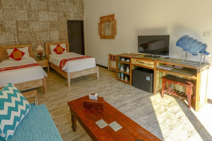 Imagen de la habitación del Hotel Kura Kura Beach Resort. Foto 25