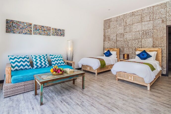 Imagen de la habitación del Hotel Kura Kura Beach Resort. Foto 30