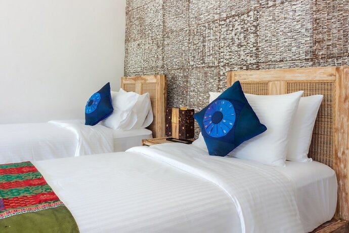 Imagen de la habitación del Hotel Kura Kura Beach Resort. Foto 34