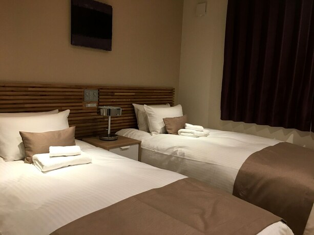 Imagen de la habitación del Hotel Kuranoya Furano. Foto 37