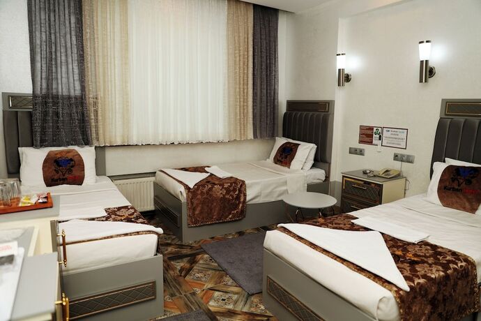 Imagen de la habitación del Hotel Kurban. Foto 18