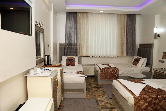 Imagen de la habitación del Hotel Kurban. Foto 19