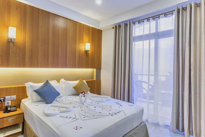 Imagen de la habitación del Hotel Kuredhi Beach Inn. Foto 8