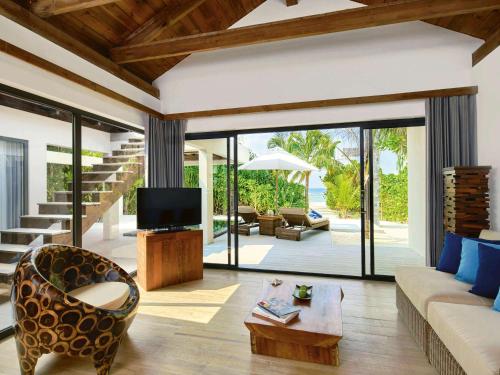 Imagen de la habitación del Hotel Kuredhivaru Resort and Spa Maldives. Foto 19