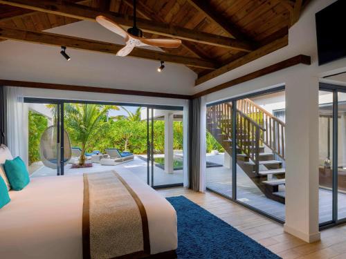 Imagen de la habitación del Hotel Kuredhivaru Resort and Spa Maldives. Foto 20